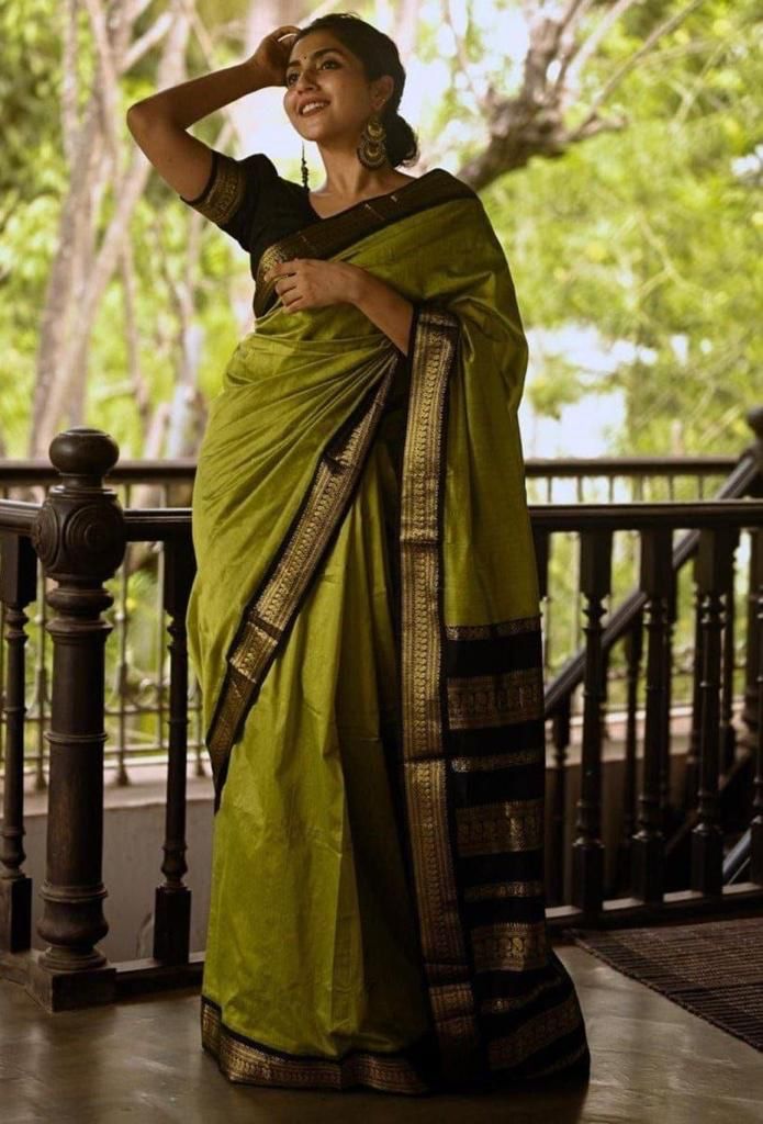 Parrot Green Soft Silk Saree With Zari Weaving Work